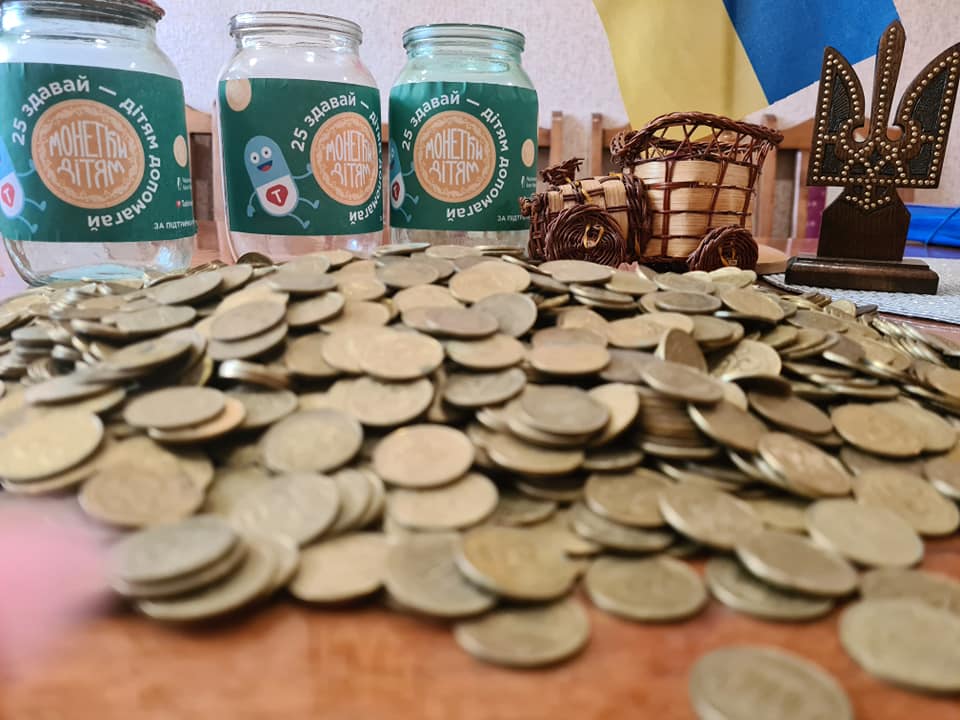 фото акции монеты детям