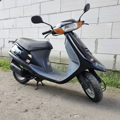 мопед жінка